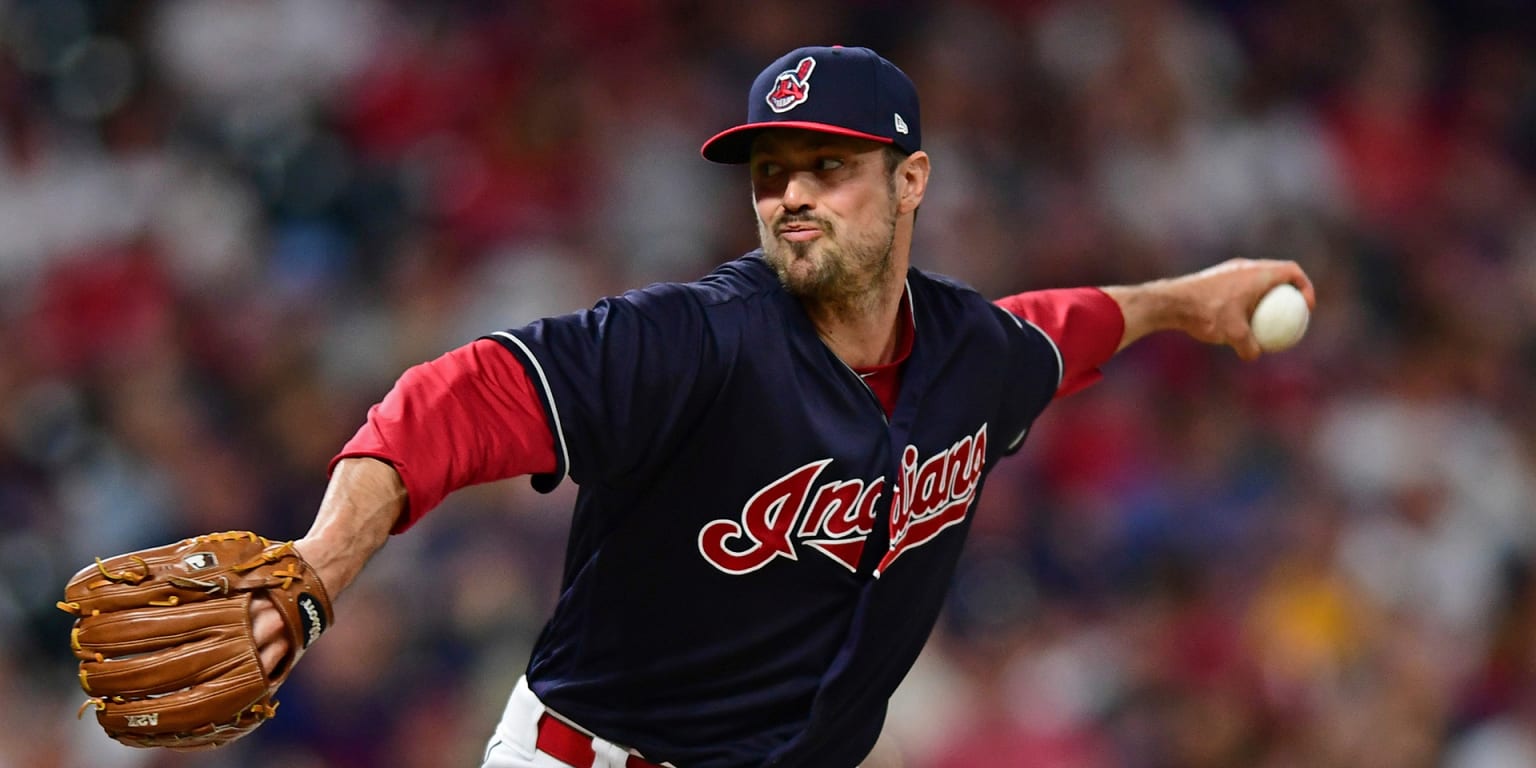 Cleveland Indians pitcher Andrew Miller throws to the Minnesota