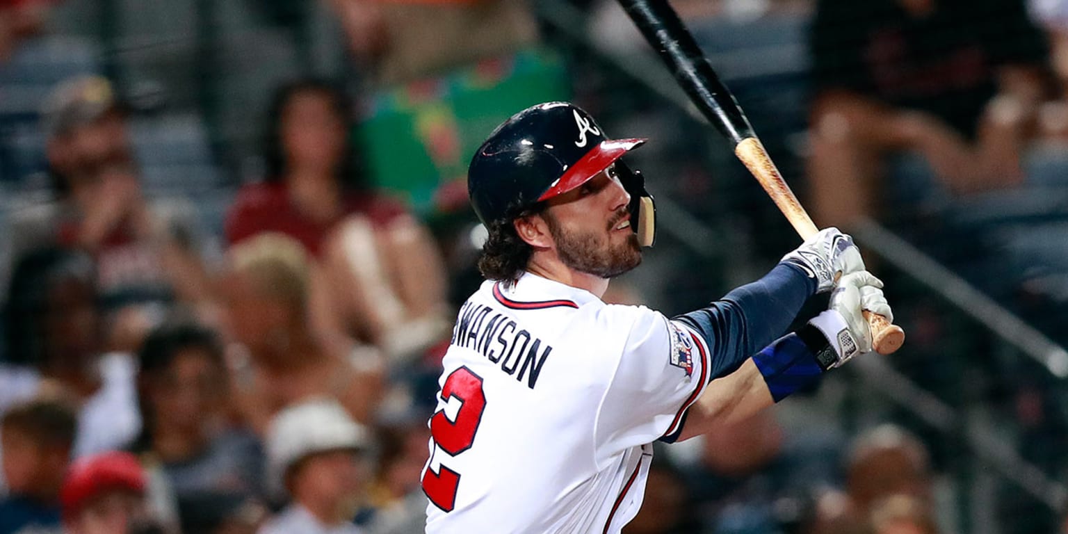 Dansby Swanson pulled after being hit by throw