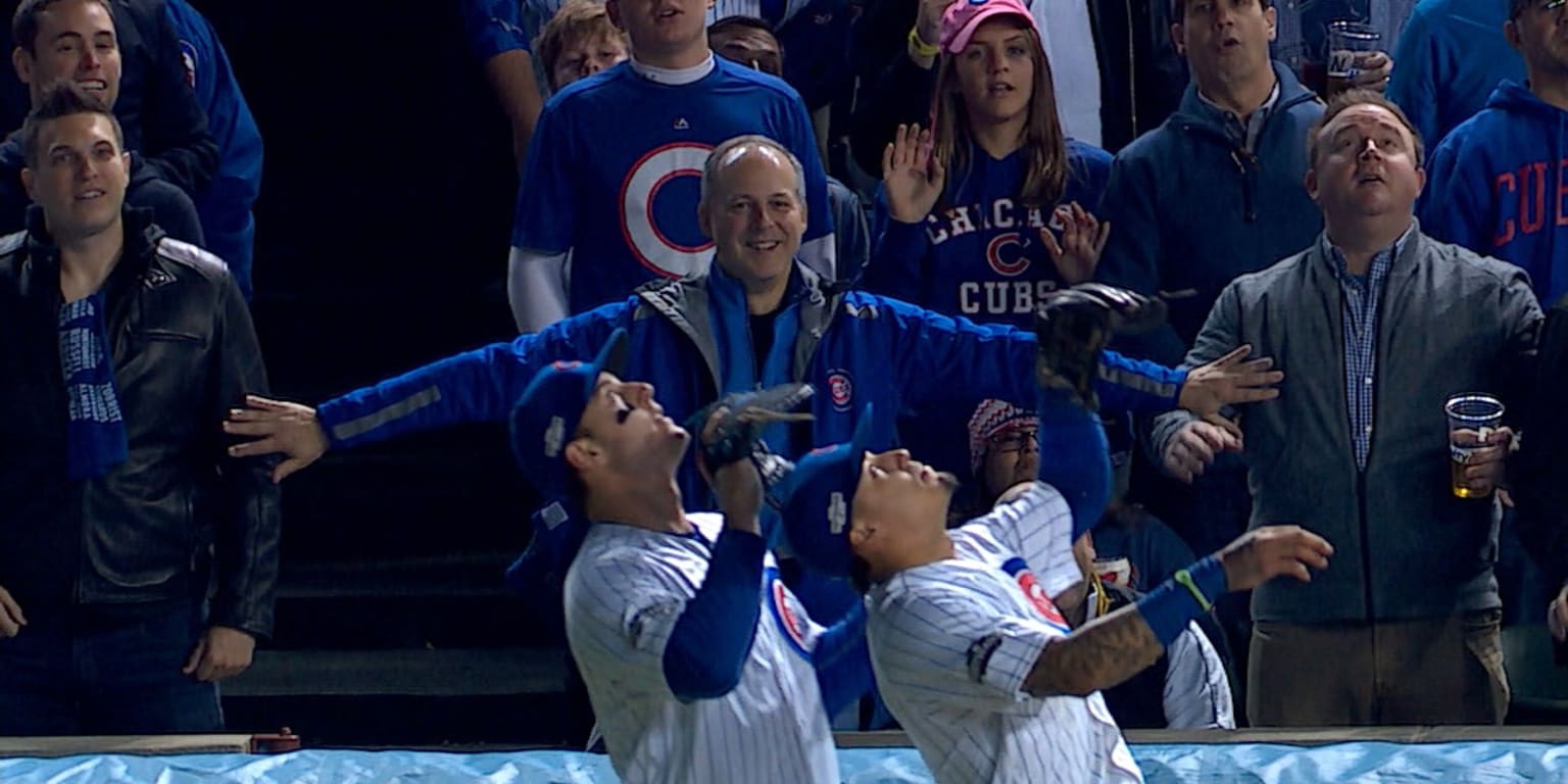 This intrepid Cubs fan is ensuring that no spectators interfere with the field of play