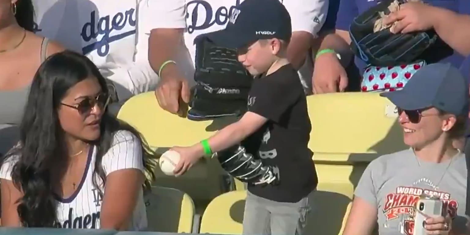 dodgers fan catches ball with kid｜TikTok Search