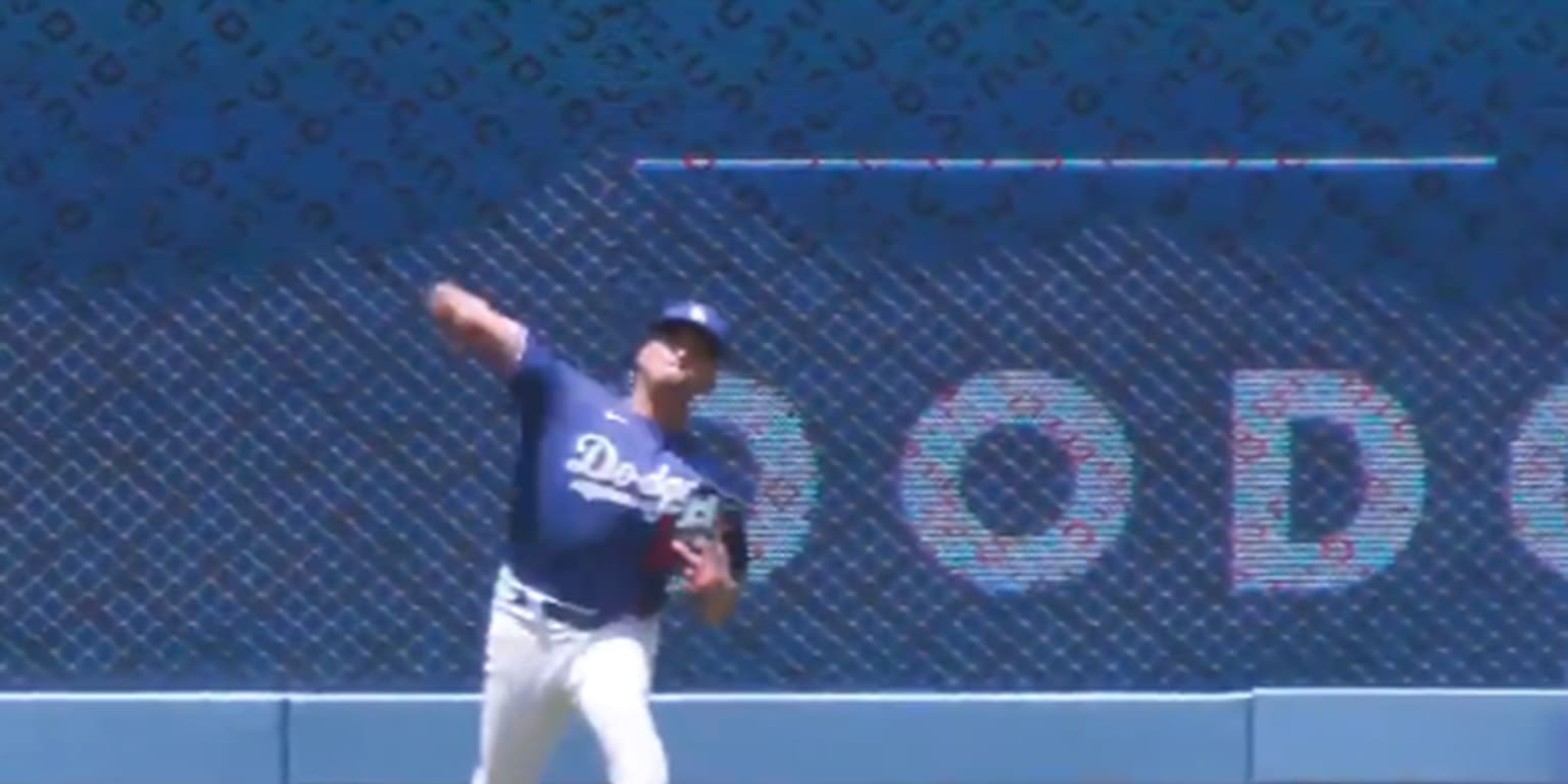 Dodgers clubhouse attendant throws out runner