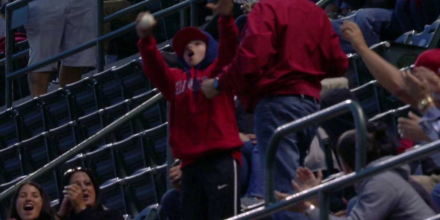 Son, father dab after foul ball catch at Angels game | MLB.com