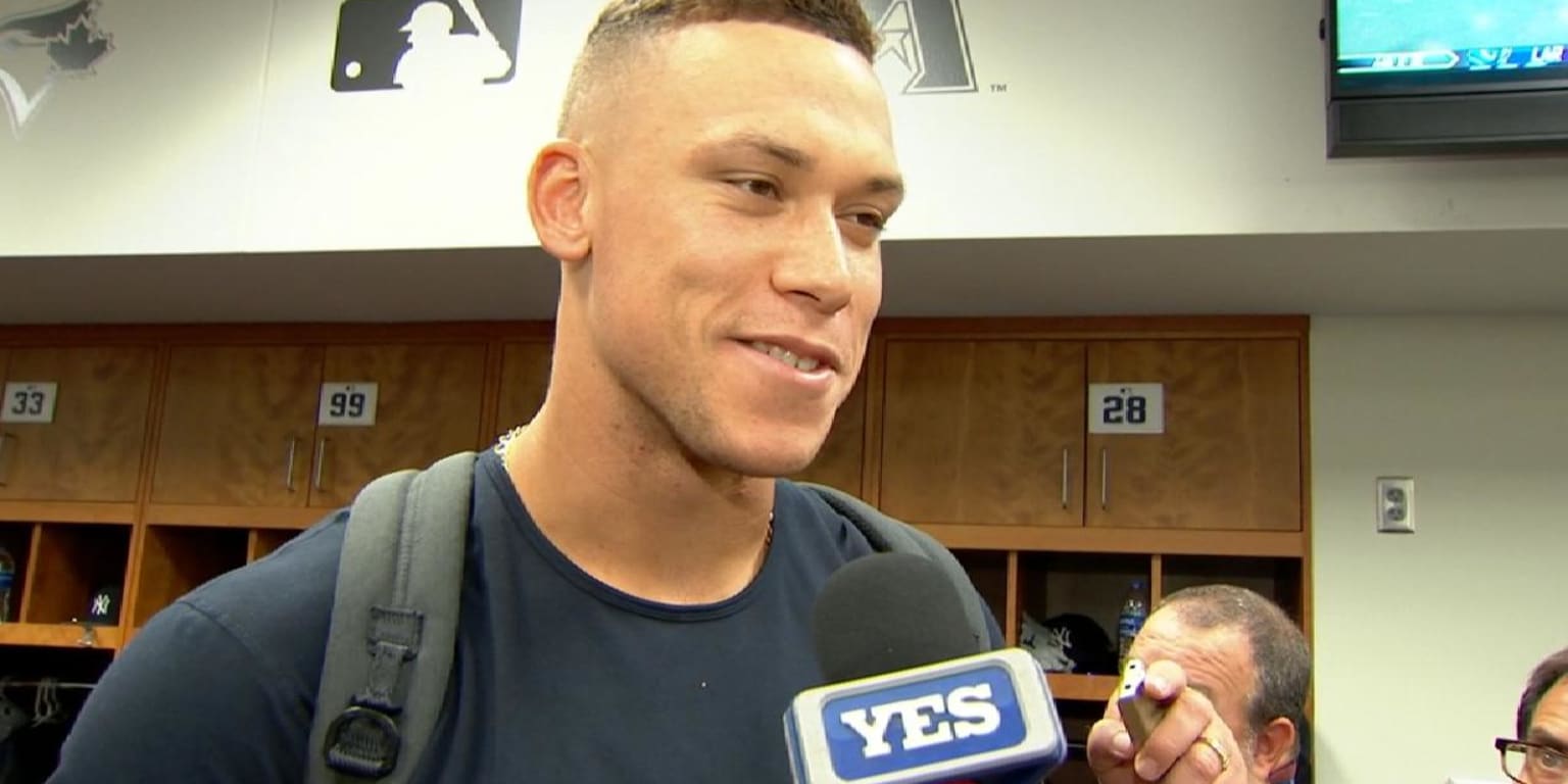 FILE – In this May 4, 2018, file photo, baseball fans wearing New York  Yankees' Aaron Judge (99) jerseys watch batting practice before a baseball  game between the New York Yankees and