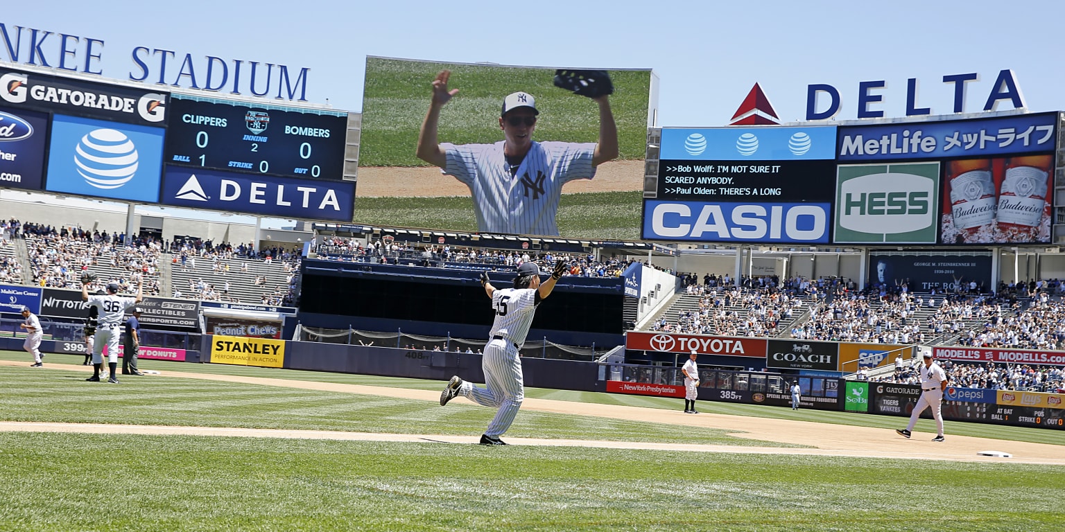 New York Yankees' Hideki Matsui, right, celebrates with teammate