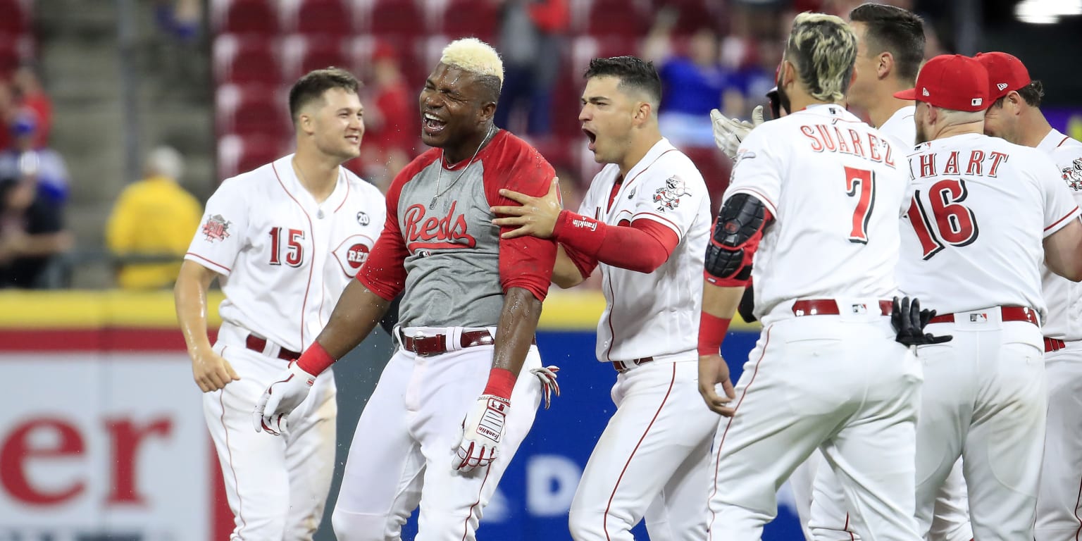 Puig comes up big as Reds beat Brewers in extras