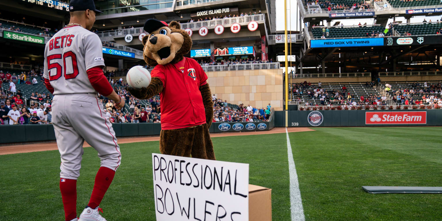T.C., the Minnesota Twins mascot, encourages the crowd before a