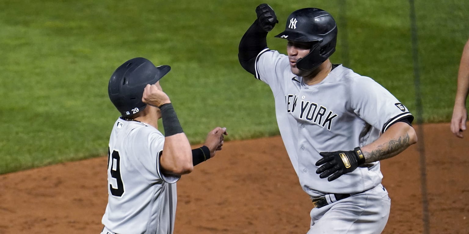 New York Yankees' Tyler Wade flips his bat after hitting a two-run