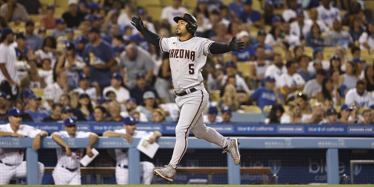 Arizona Diamondbacks' Eduardo Escobar (5) is congratulated by