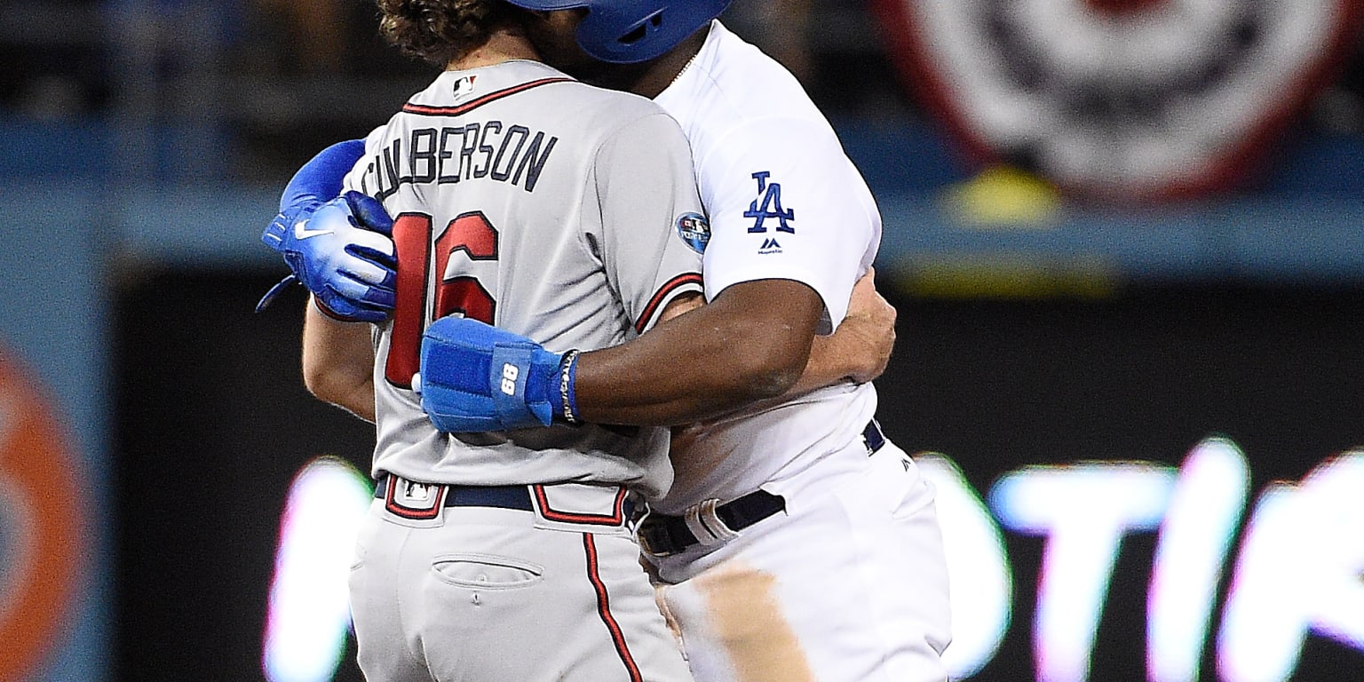 Yasiel Puig and his infant son get blue mohawks for the World