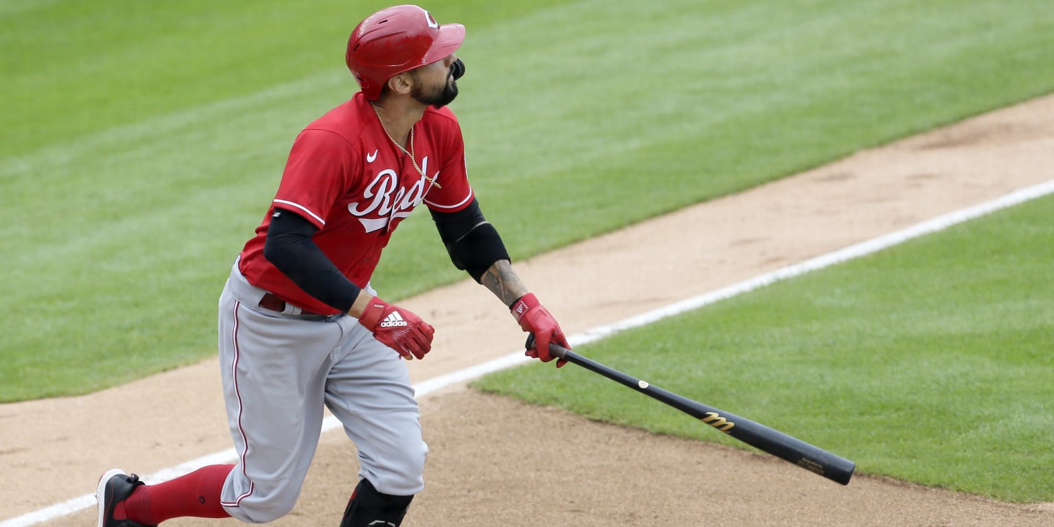 Nick Castellanos homers twice, Reds drop Cubs 13-12 in extra