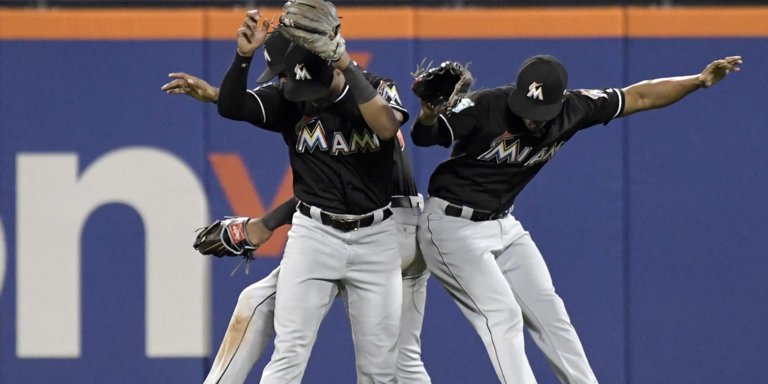 San Francisco Giants' Lewis Brinson, from left, celebrates with