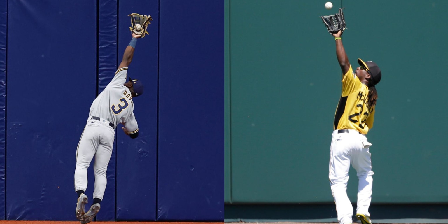 Houston Astros' Craig Biggio makes a diving catch of a ball hit by