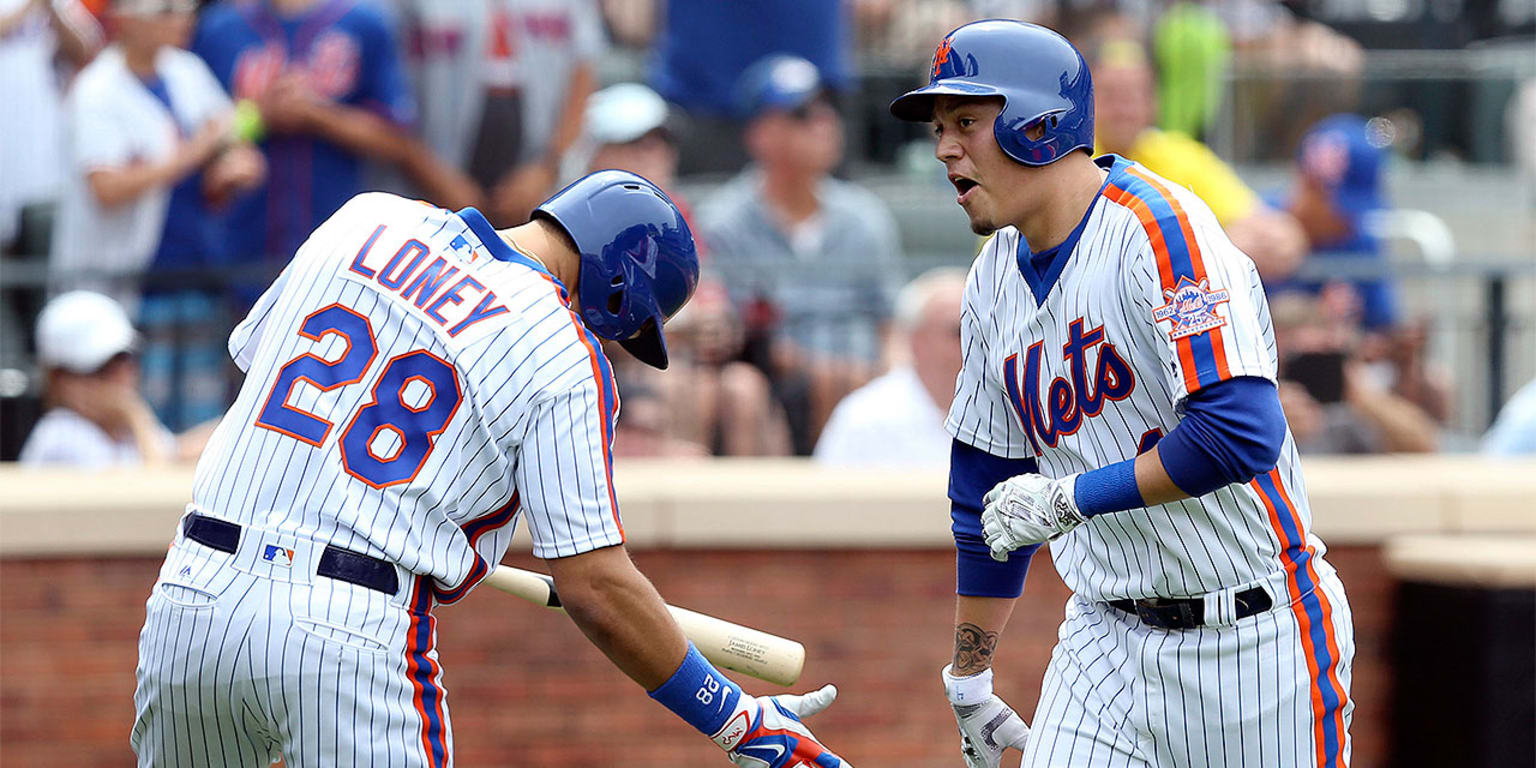 June 18, 2016: New York Mets third baseman Wilmer Flores (4) tries to beat  out a throw to the plate during a regular season game between the Atlanta  Braves and the New