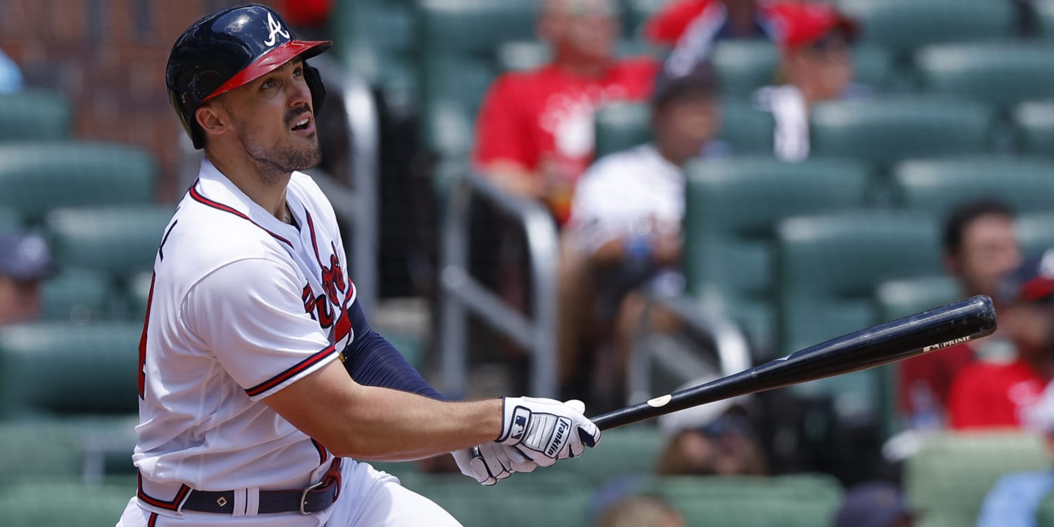 Atlanta Braves' Adam Duvall (14) swings in the second inning of a