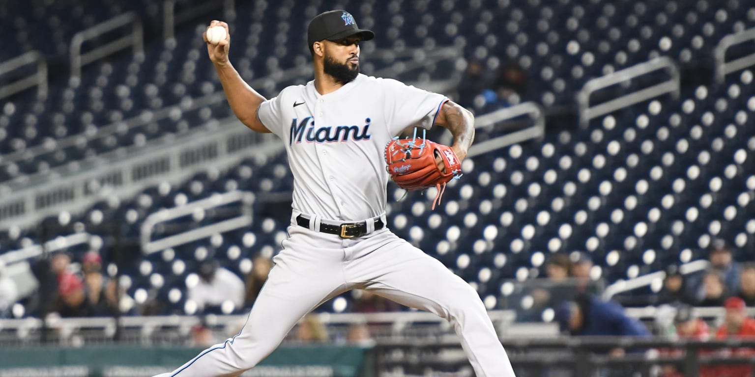 Joey Wendle of the Miami Marlins throws to first base for an out