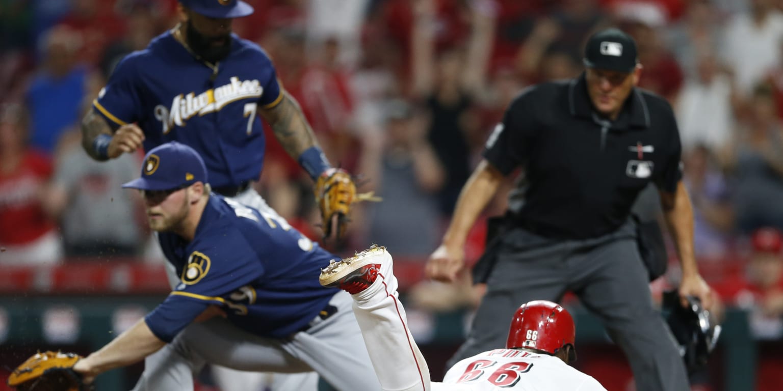 Brewers fall to Reds in 11 innings