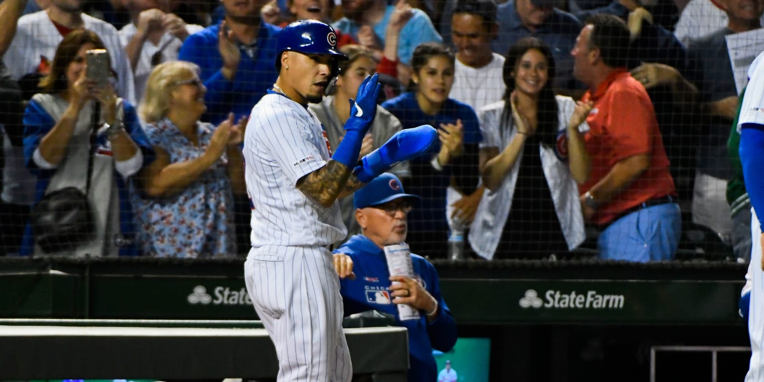 St. Louis, United States. 27th Sep, 2019. Chicago Cubs Javier Baez smiles  as he comes back into the dugout after pinch running in the sixth inning  against the St. Louis Cardinals at