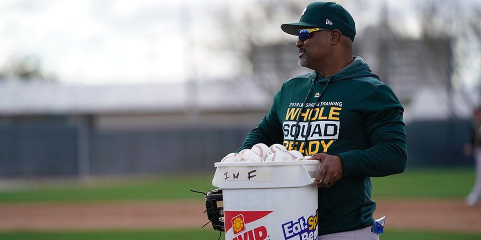 Oakland Athletics' JJ Bleday (33) is congratulated by third base coach Eric  Martins (3) as he runs the bases after hitting a home run during the second  inning against the Seattle Mariners