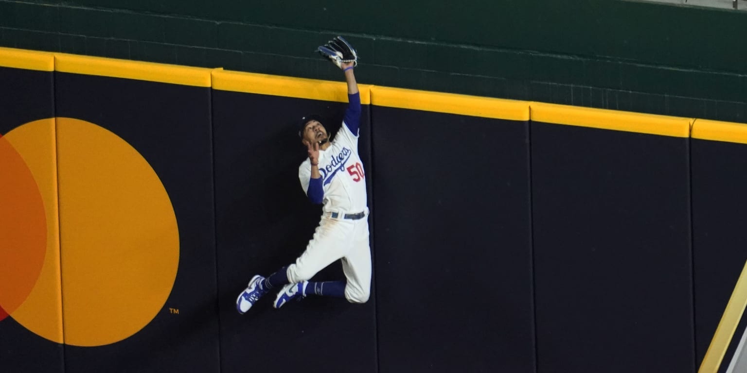 Los Angeles Dodgers right fielder Mookie Betts (50) makes a catch