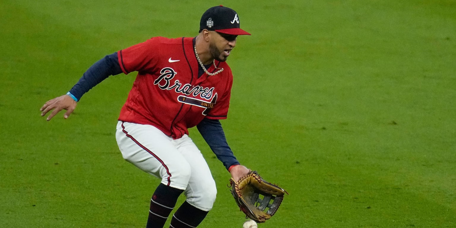 Eddie Rosario of the Atlanta Braves smiles after hitting a single