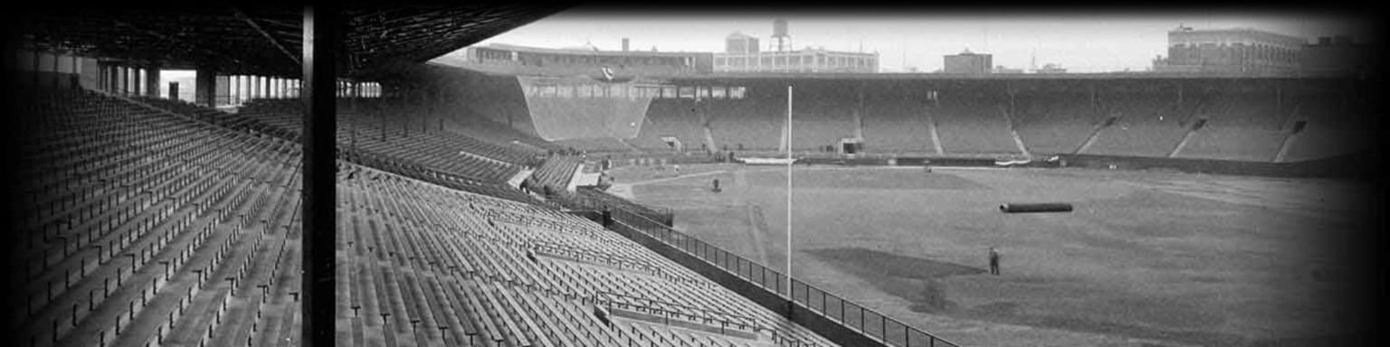 Fenway Park, Boston, MA, July 4, 1947 – Red Sox great Ted Williams in left  field with the freshly painted Green Monster behind him