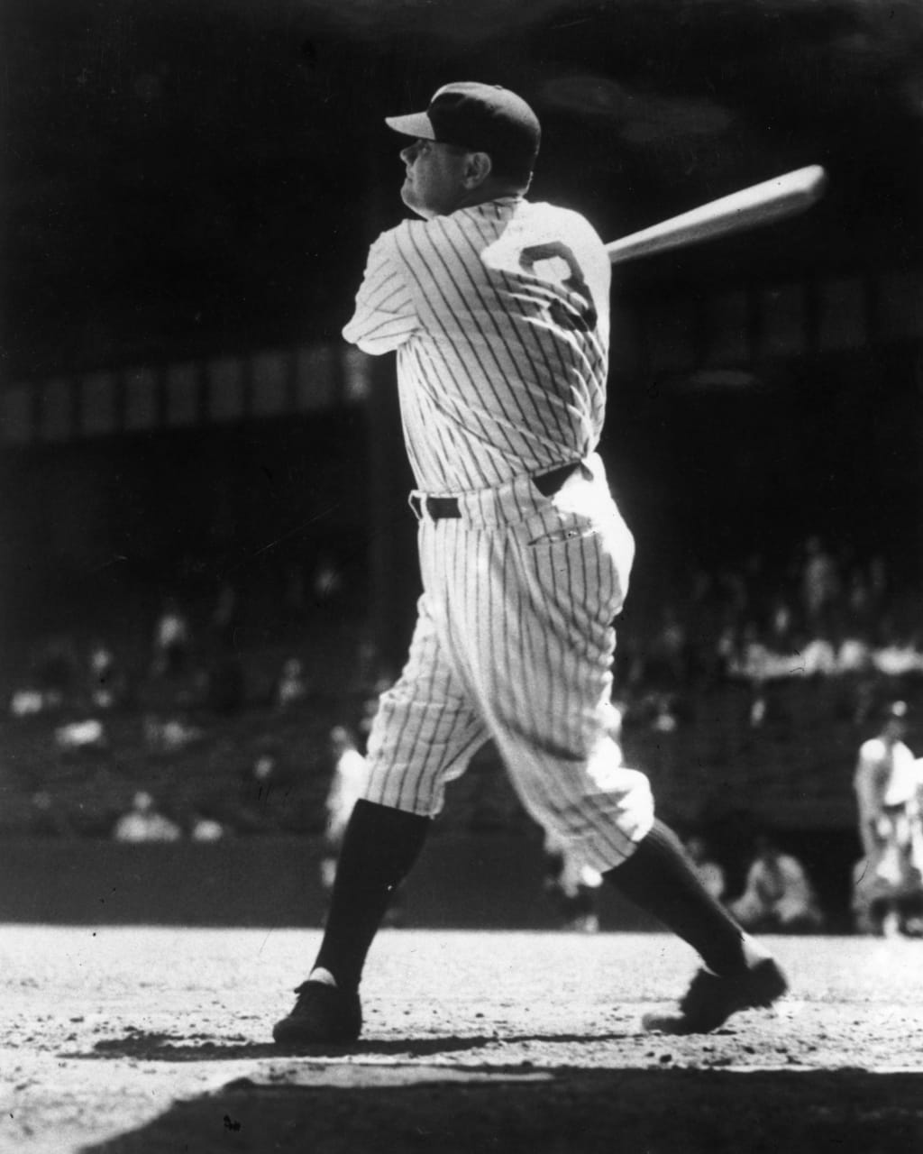 Just two dozen players in history can say they have hit three home runs in a game while playing for the Yankees. Ruth was the first to do it, in typically Ruthian fashion. After promising a sick boy that he would hit a home run for him, the Bambino blasted three round-trippers during Game 4 of the 1926 World Series. (Credit: Getty Images)