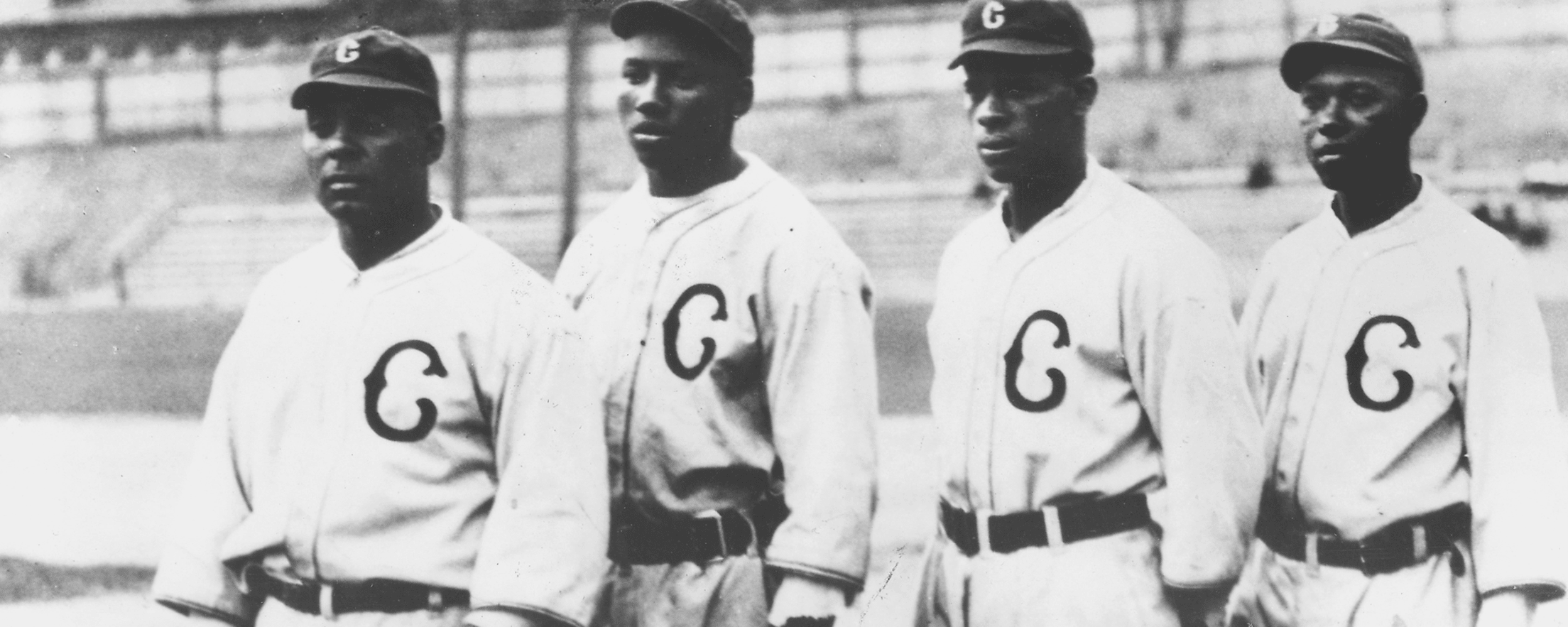 BASEBALL: NEGRO LEAGUES. /n'Cool Papa' Bell (front row, center), 'Satchel'  Paige (middle, far right), Josh Gibson (back, far left) and other members  of an American Negro Leagues All-Star team which participated in