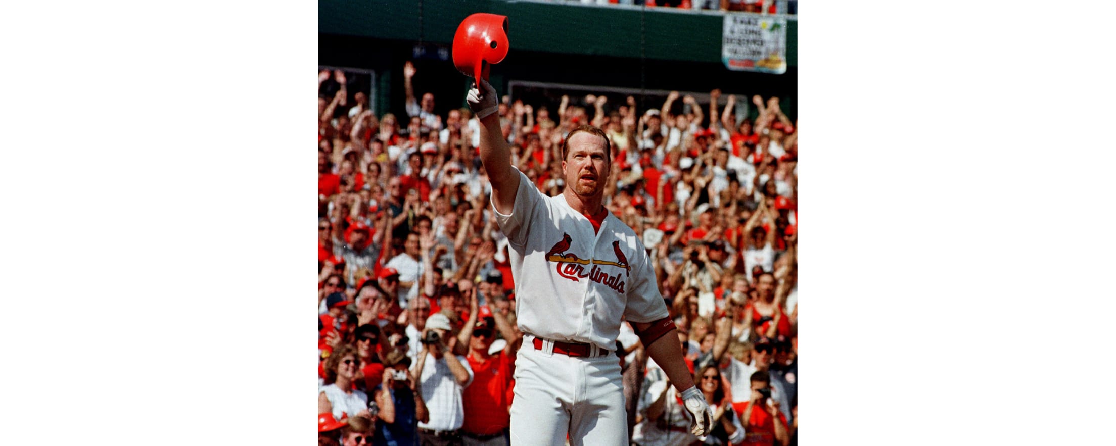 Sept. 27, 1998: McGwire hits 70 and is saluted as 'the new American sports  hero