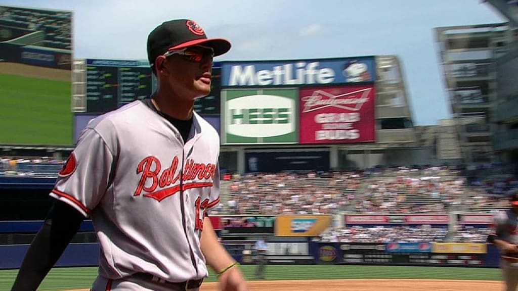 Machado shows off his arm