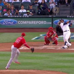 Seattle Mariners on-deck batter Franklin Gutierrez, left, watches