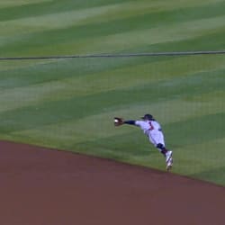 Ozzie makes an incredible diving stop, throw 