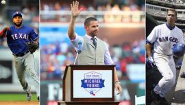 Texas Rangers shortstop Michael Young sits with his wife, Cristina