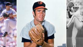 Baltimore Orioles' pitcher Mike Boddicker, right, is congratulated