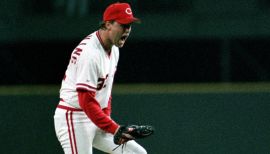 Cincinnati Reds pitcher Jose Rijo hugs his wife, Rosie Rijo, and his son, Jose  Rijo Jr. on the field after the World Series win, Saturday, Oct. 20, 1990,  Oakland, Calif. Rijo was