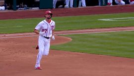 Yadiel Hernandez reaches on a fielding error by shortstop Dansby Swanson., 06/15/2022