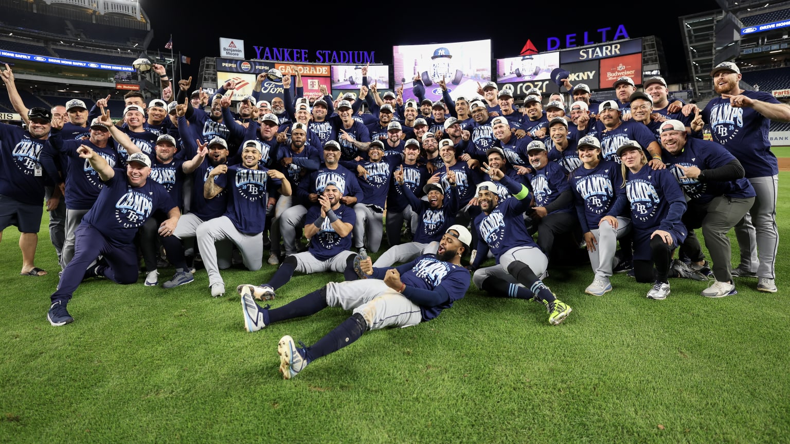 Tampa Bay Rays players and Kevin Cash celebrating the 2026 AL East title at Yankee Stadium