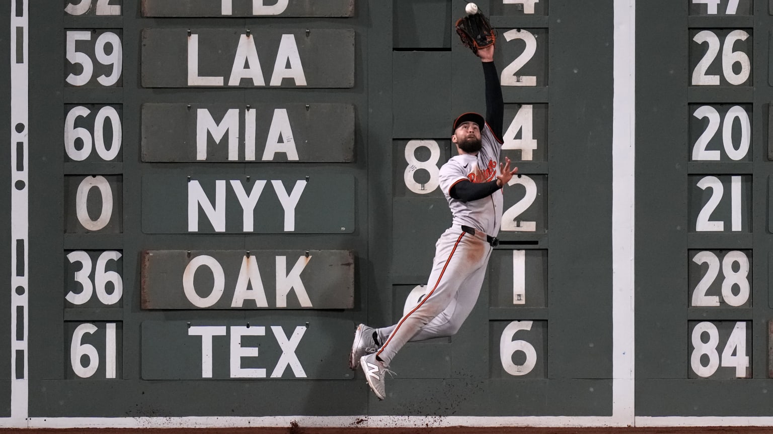 Colton Cowser making a leaping Orioles outfield catch, showing the defensive style behind his 2026 home run robberies
