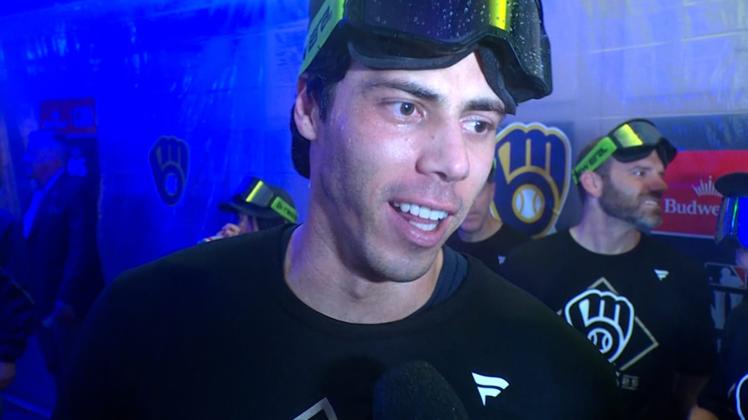 Christian Yelich speaks with reporters after a Milwaukee Brewers postseason celebration