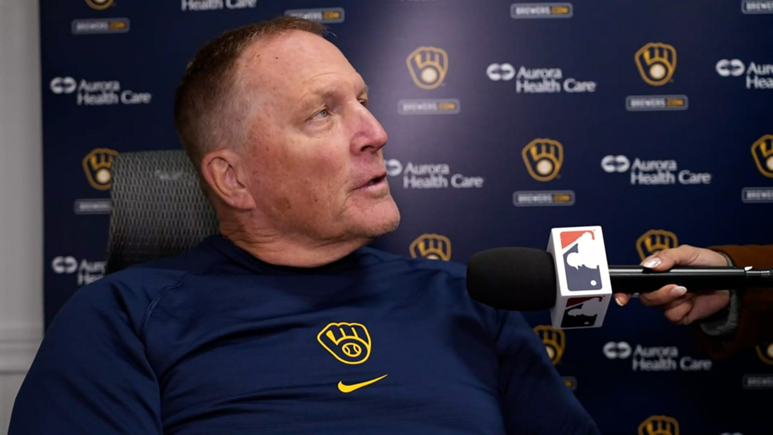 Milwaukee Brewers manager Pat Murphy speaks with reporters in a team interview area