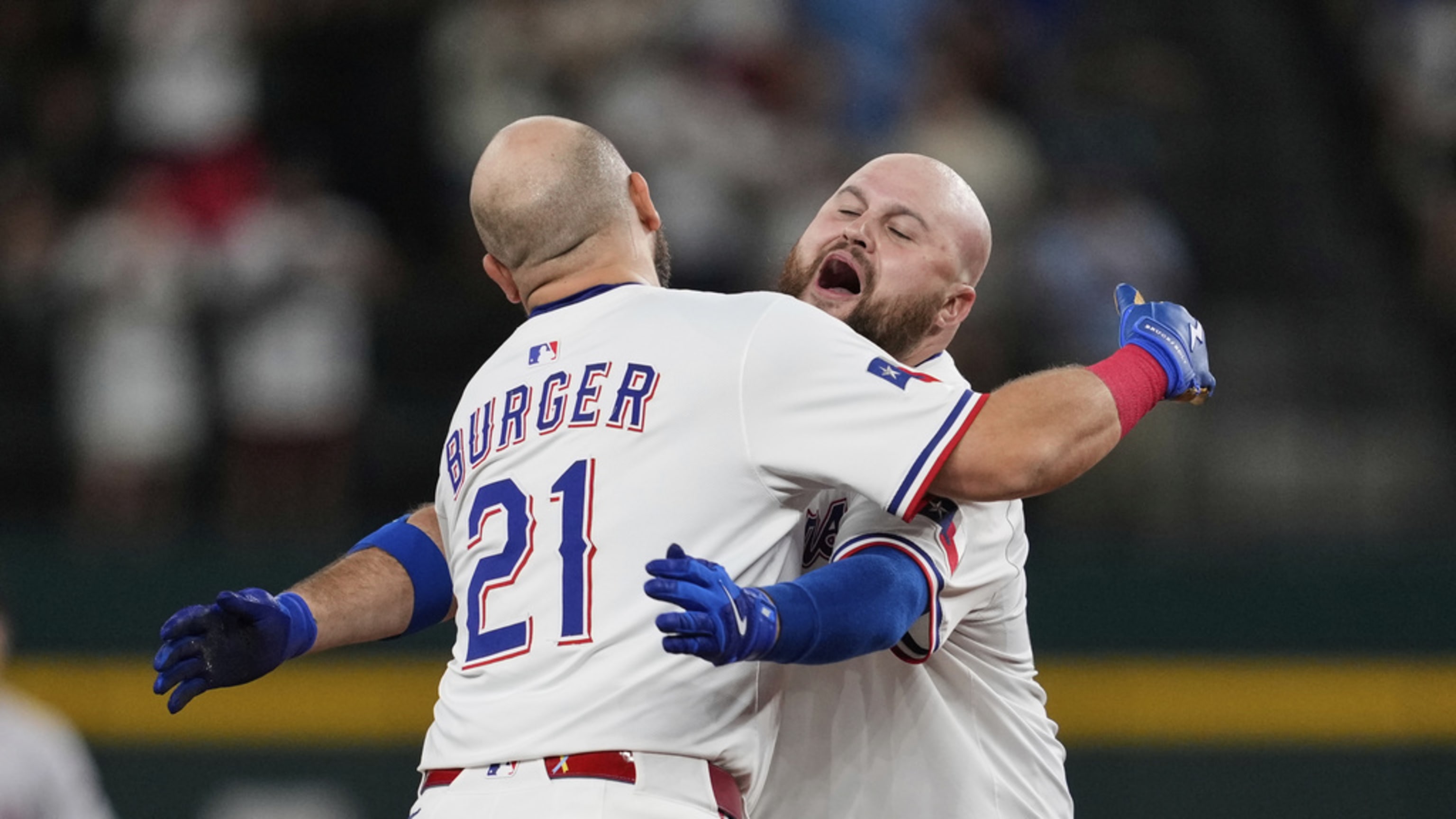Jake Burger, Chris Martin activated by Rangers