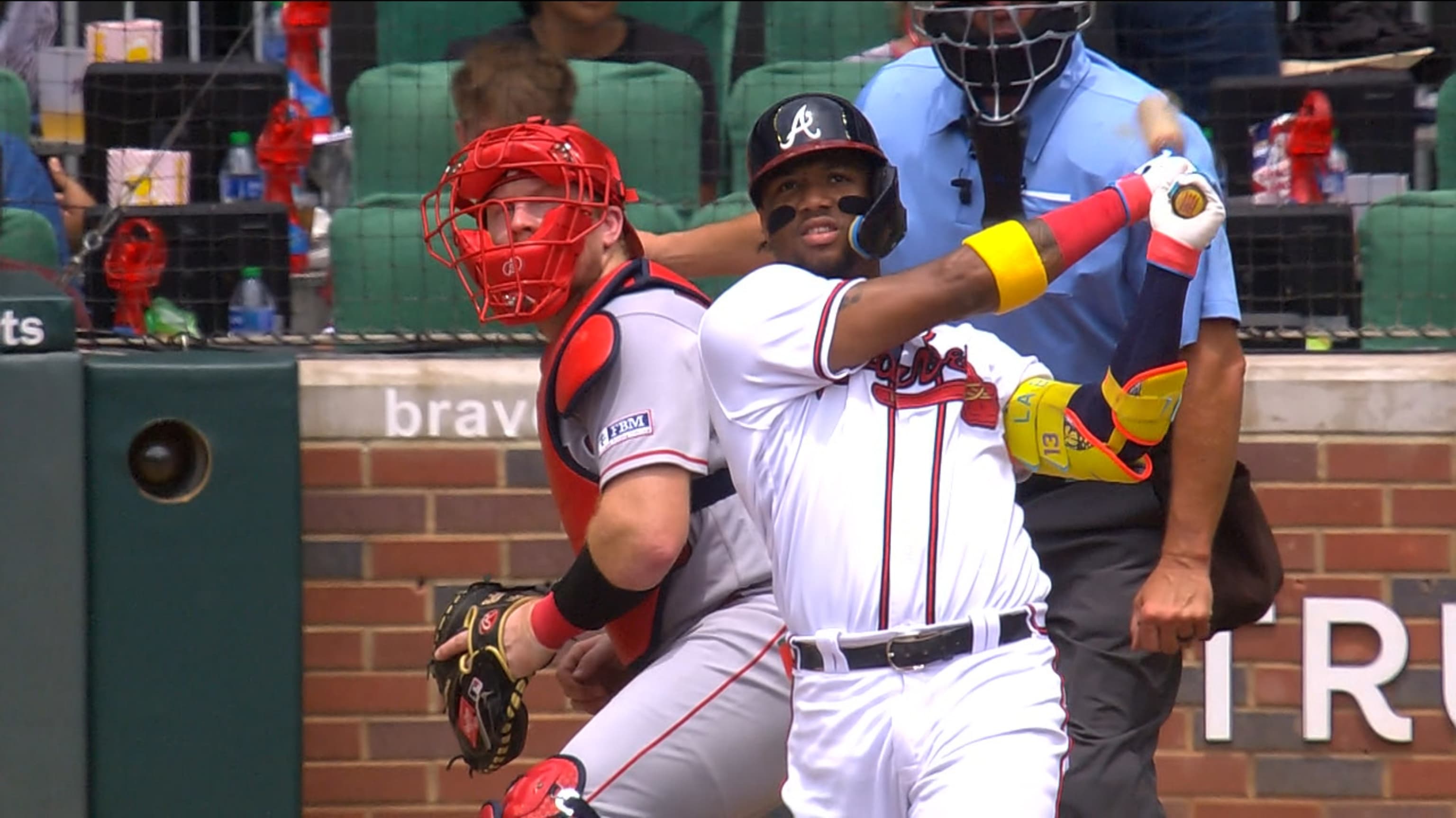 Atlanta Braves first baseman Matt Olson (28) and third baseman Austin Riley  (27) embrace after defeating