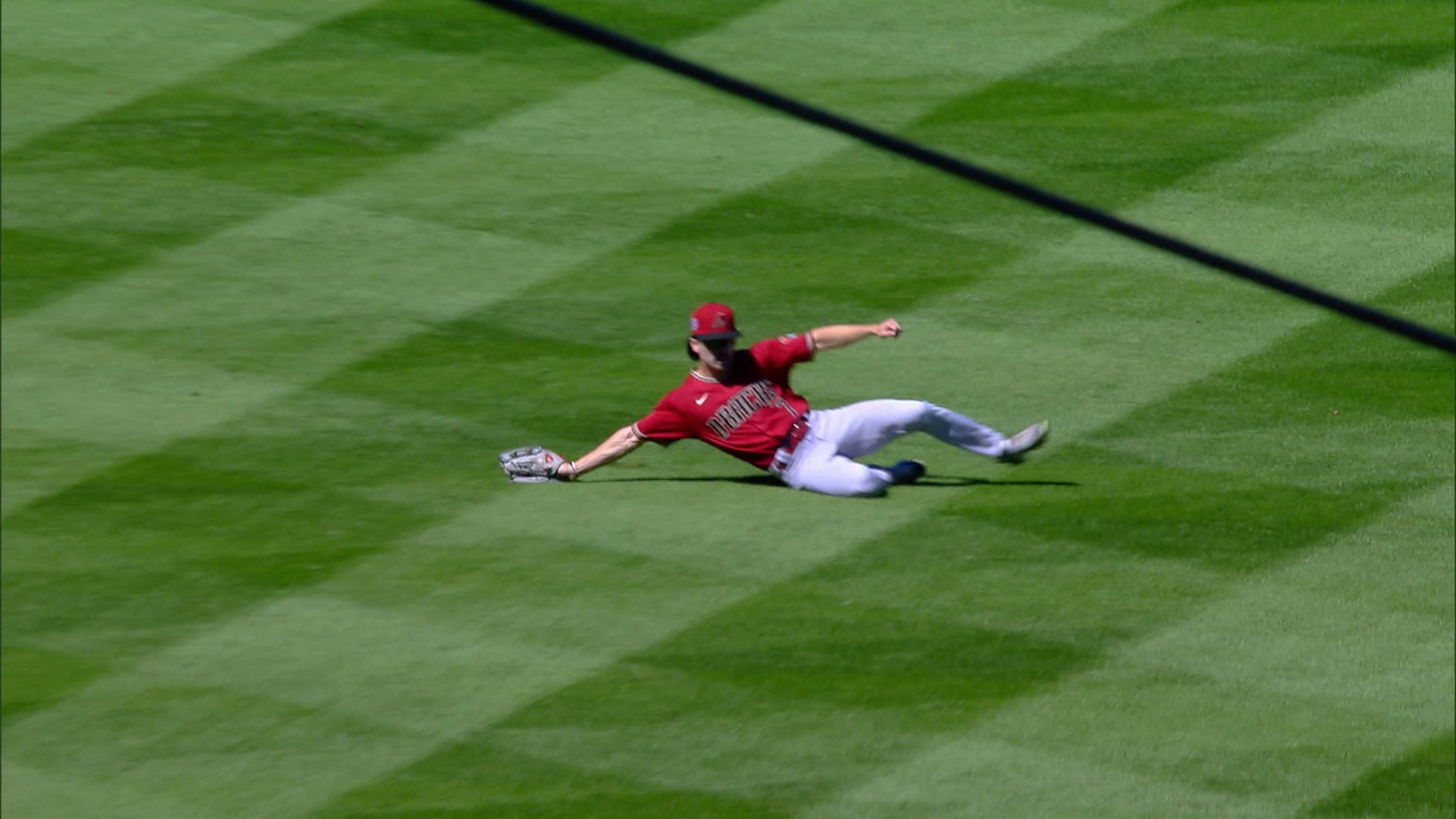 Carroll atrapa deslizándose