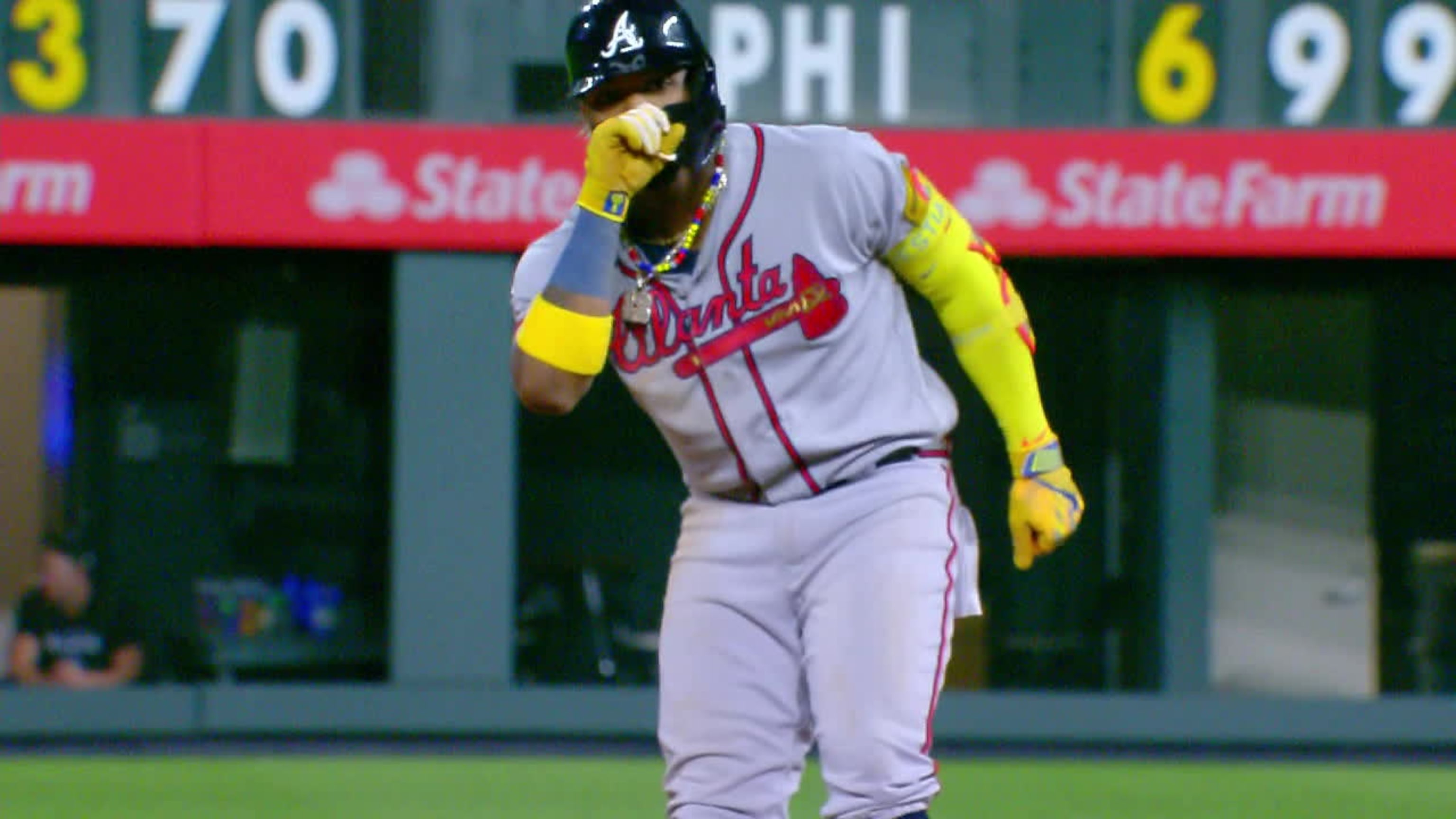 Multiple Fans Rush Field and Make Contact With Braves' Ronald