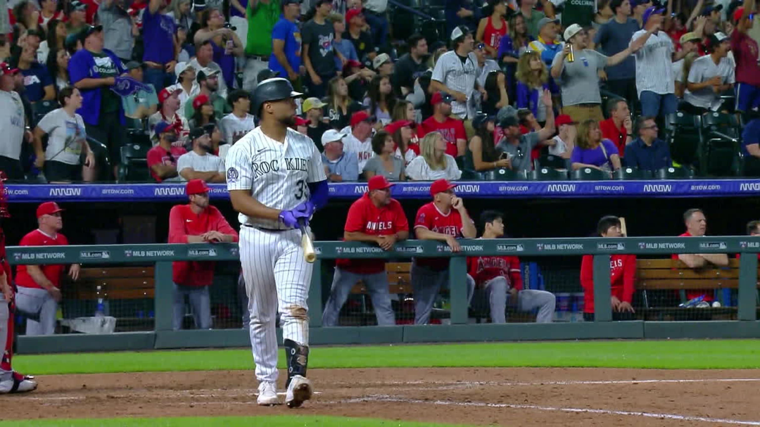 Colorado Rockies' Elias Diaz gestures after hitting a grand slam off Los  Angeles Angels relief pitcher Chris Devenski during the eighth inning of a  baseball game Friday, June 23, 2023, in Denver. (