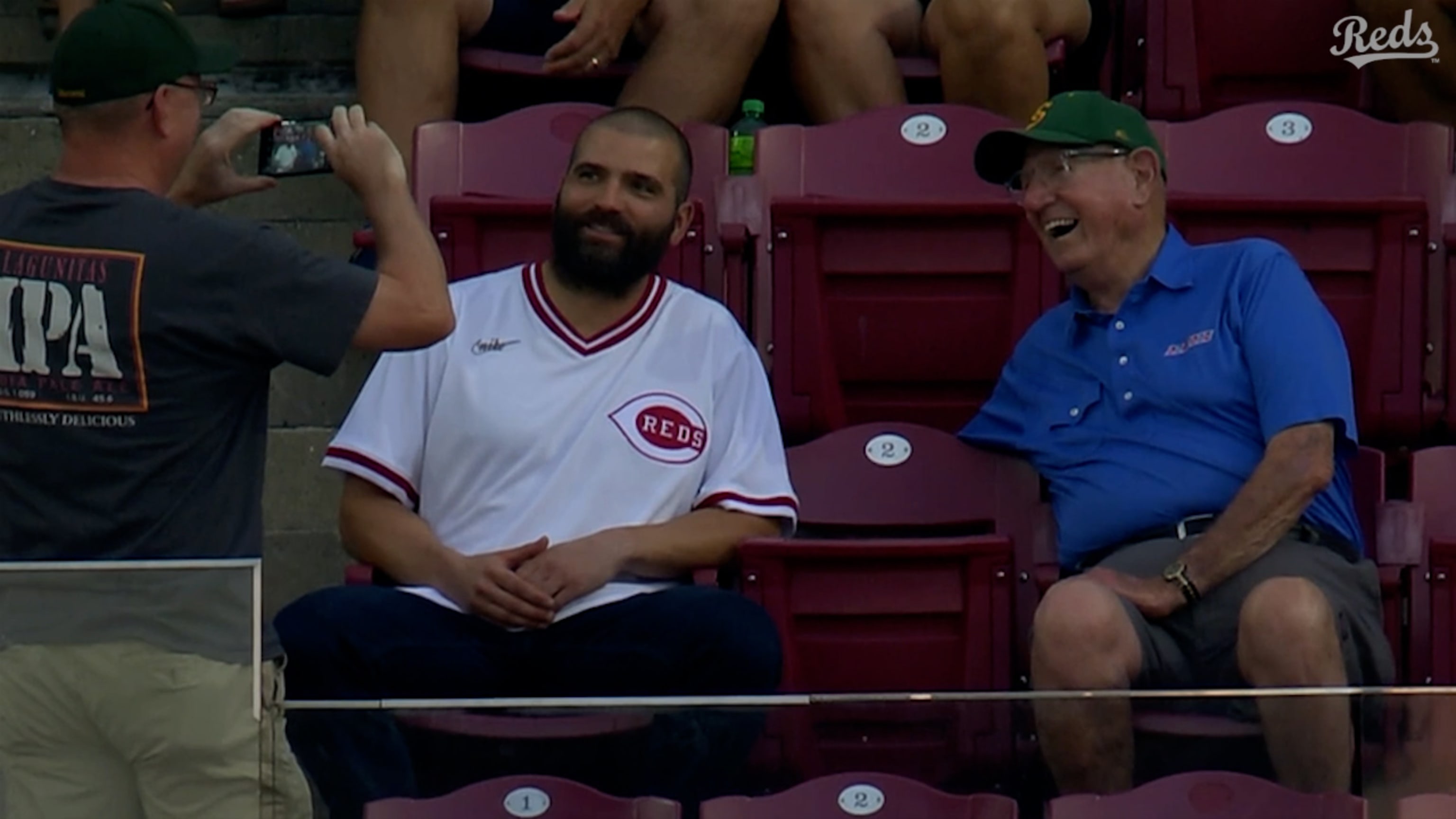 Reds' Joey Votto swaps signed jersey for fan's T-shirt during game