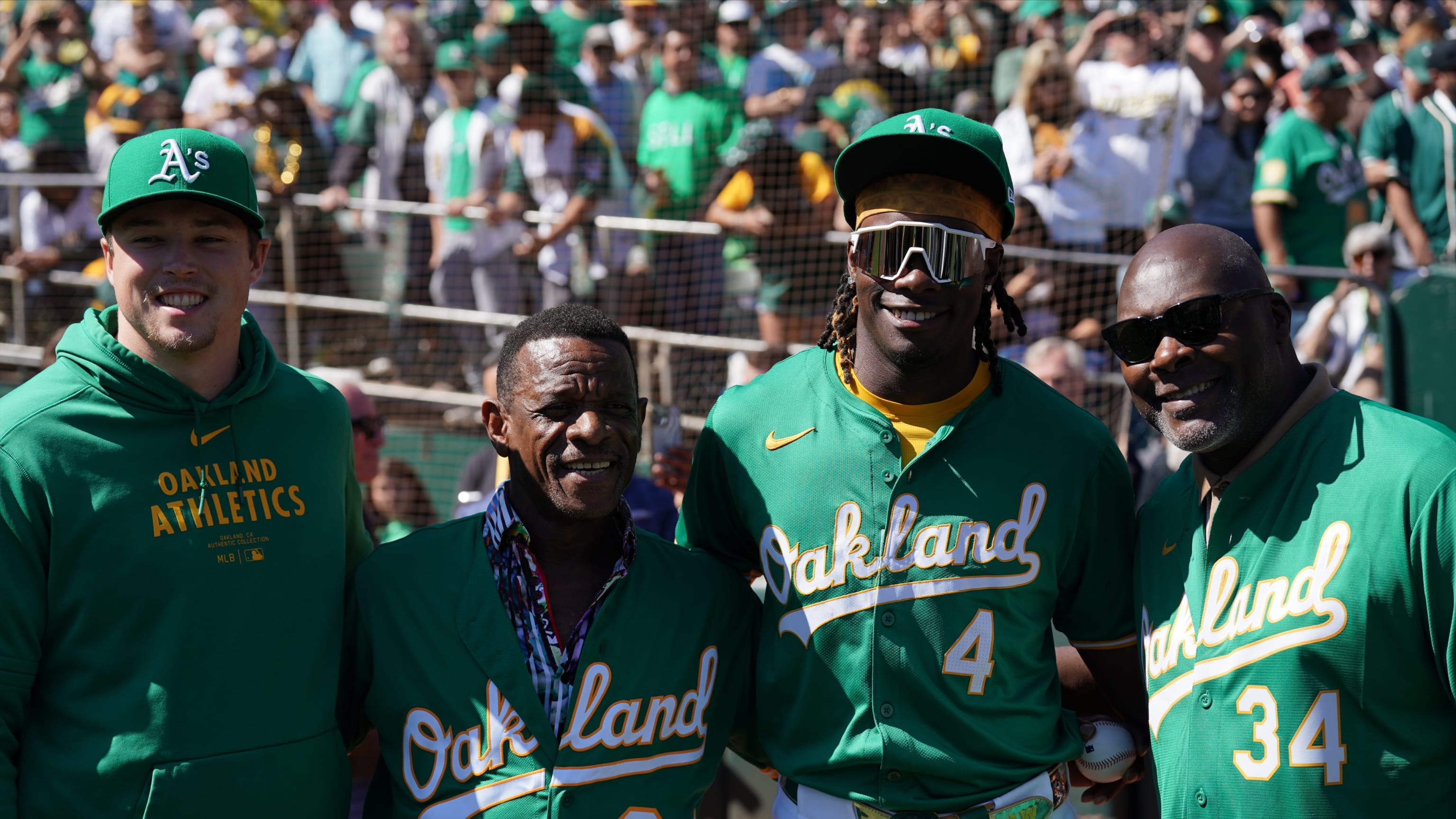 Dave Stewart y Rickey Henderson hacen el 1er pitcheo