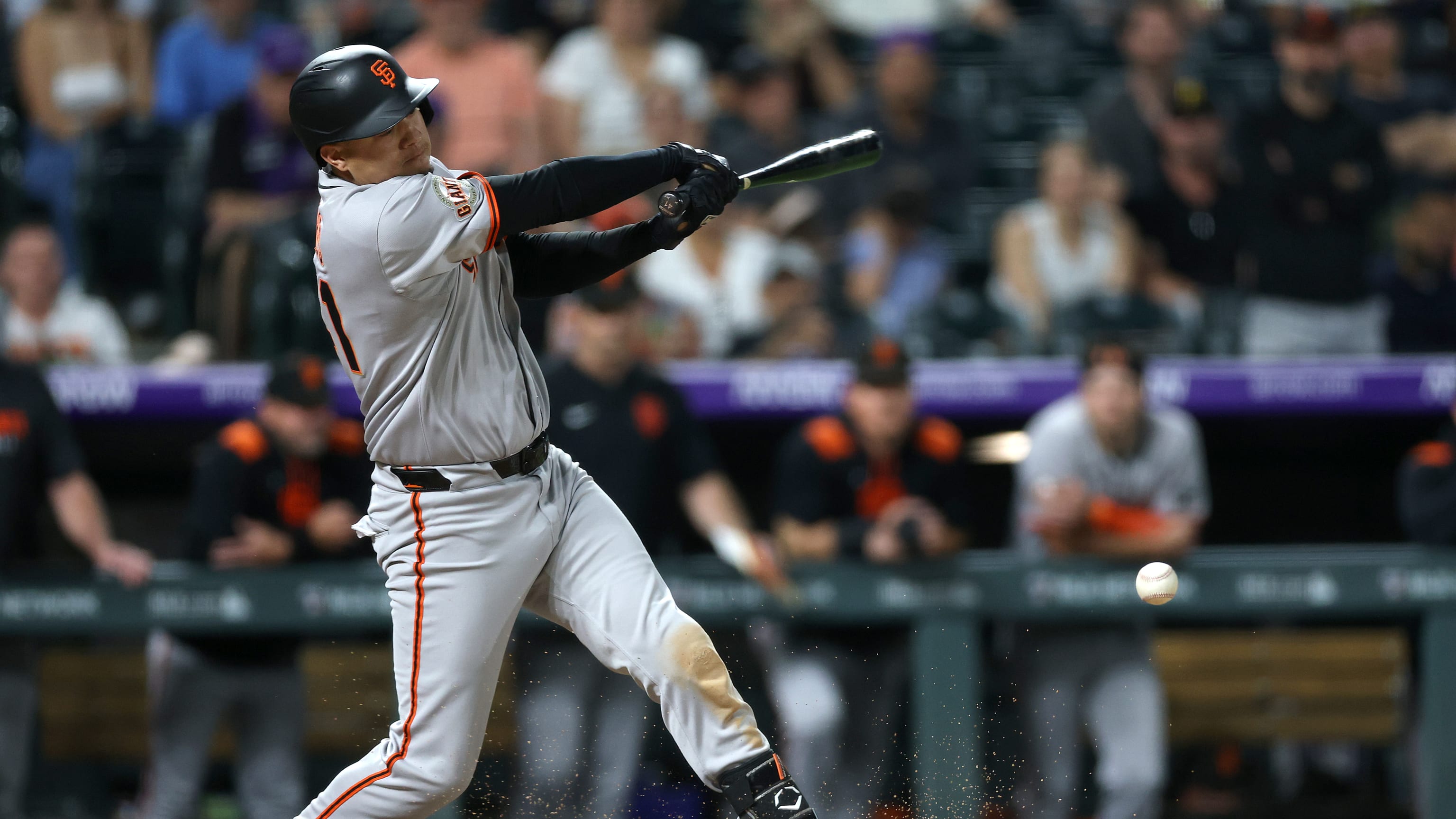 Giants rally for 4 runs in 9th to beat Rockies