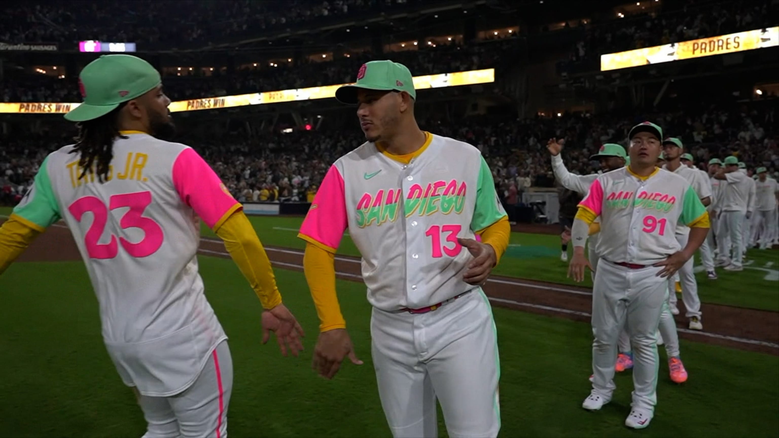 San Diego Padres' Manny Machado wears the home run chain after hitting a  solo home run during the second inning of a baseball game against the Miami  Marlins, Sunday, July 25, 2021