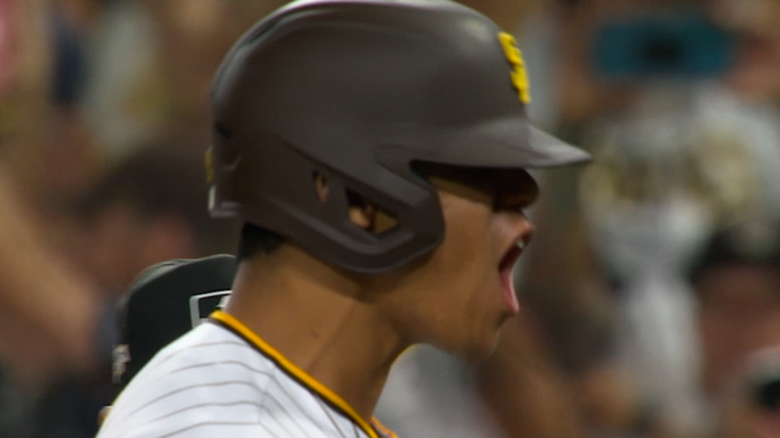 The San Diego Padres batting City Connect jersey helmets sit in