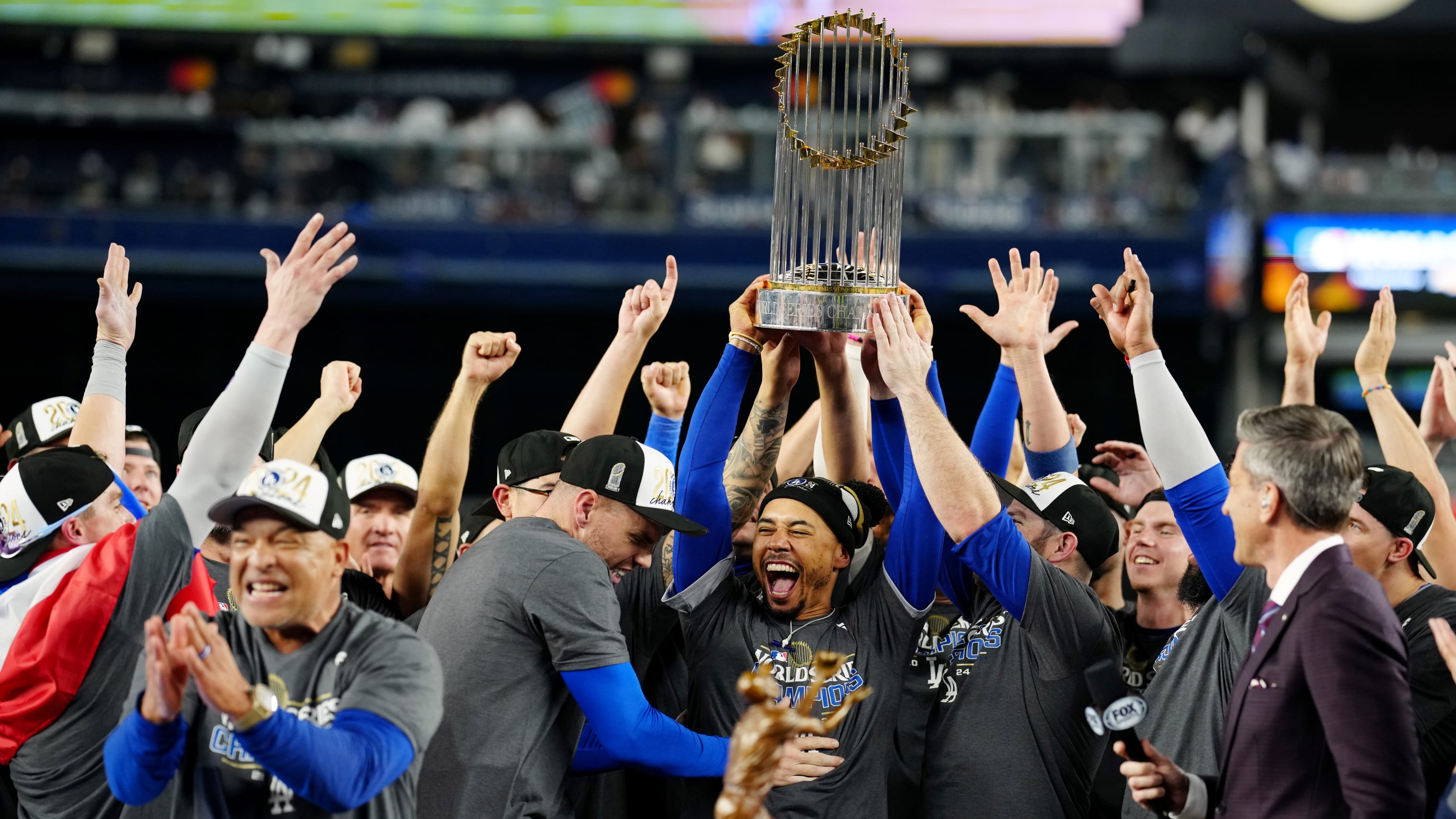 Dodgers are presented with the World Series trophy